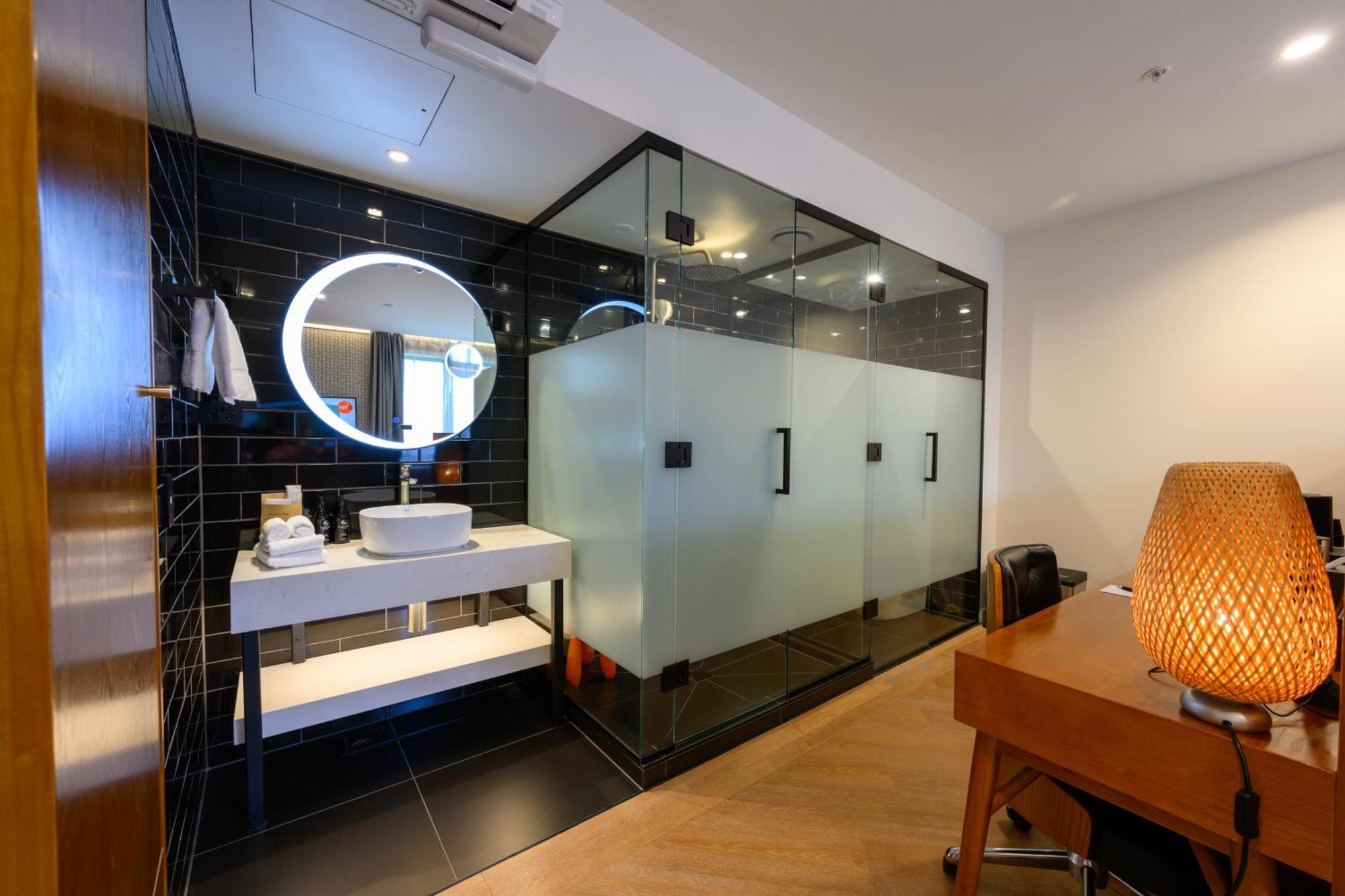 Ohtel Auckland Hotel Cameră foto A bathroom in a hotel